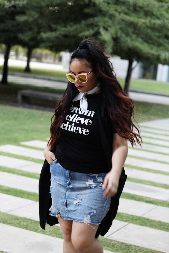 Graphic tee and tropical sneakers festival season outfit inspiration curvy